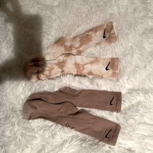Two pairs of Nike crew socks. One pair dyed brown. Second pair is plain brown.